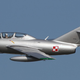 A two-seat MiG-15 bis performs at an airshow in 2016 (D. Miller)